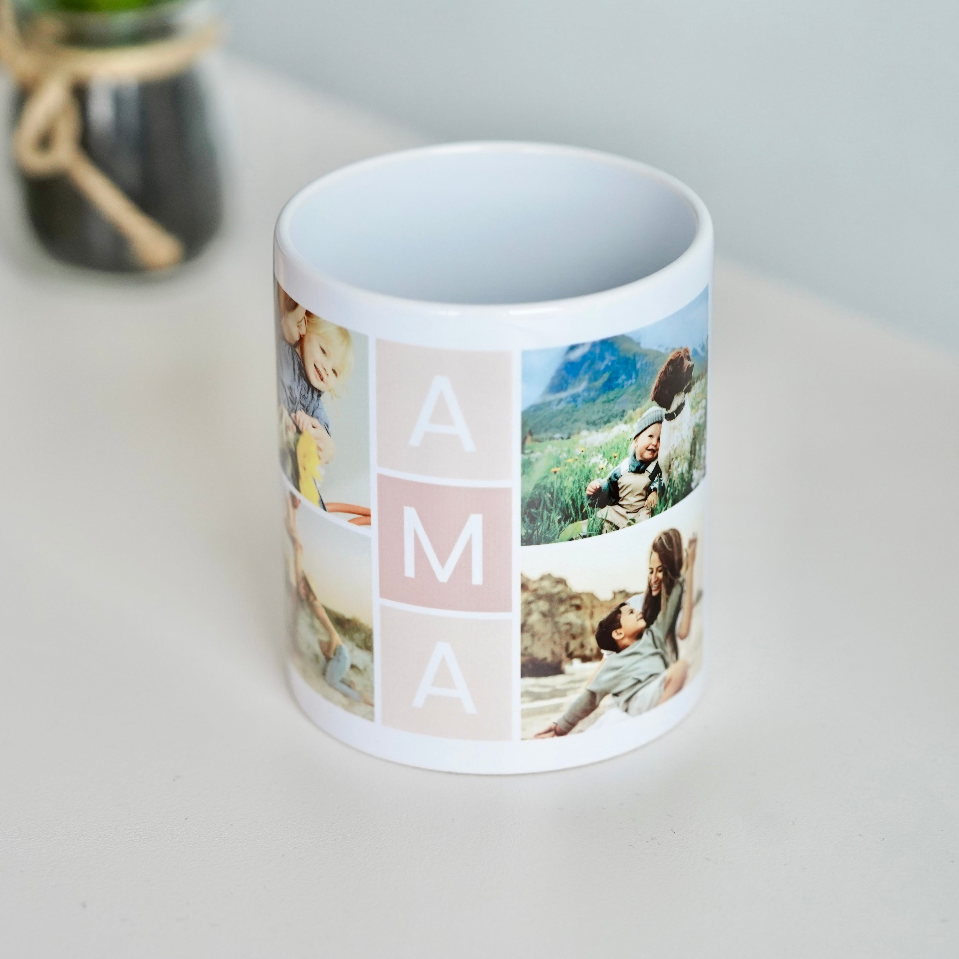 Imagen de una taza personalizada con cuatro fotos y la palabra 'AMA' en el centro,